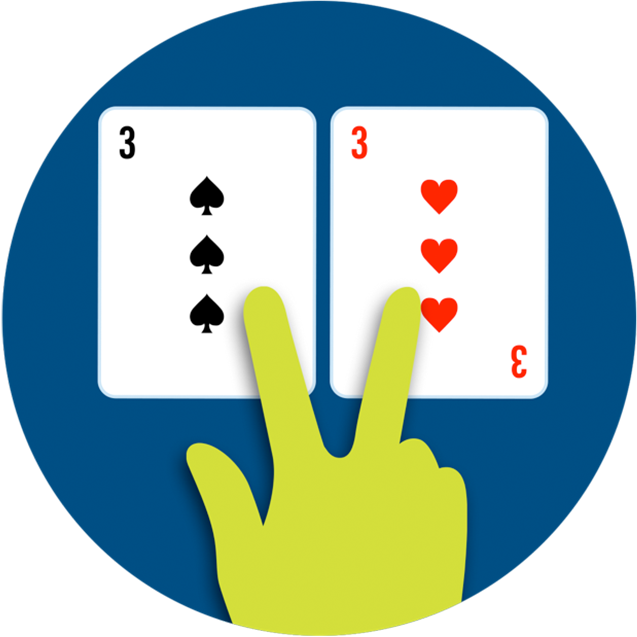 A hand splitting two cards with two fingers.