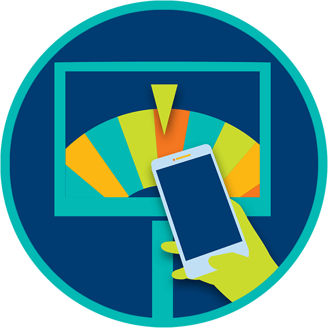 A monitor displays a multicoloured prize wheel with the pointer resting on a orange while a hand holding a phone.