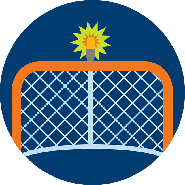 Une lumière s’allume au-dessus d’un filet de hockey