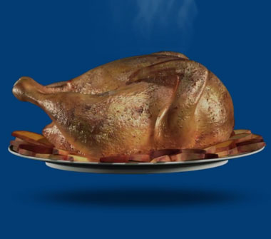 A steaming rotisserie chicken on a plate of potatoes.