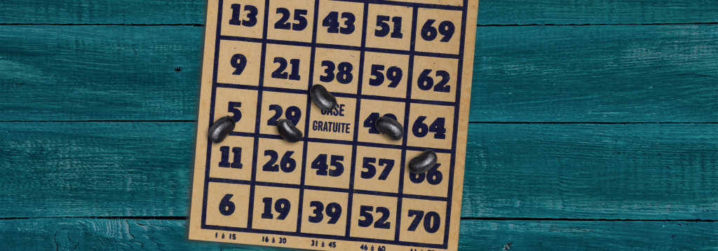Bingo card with beans on top.