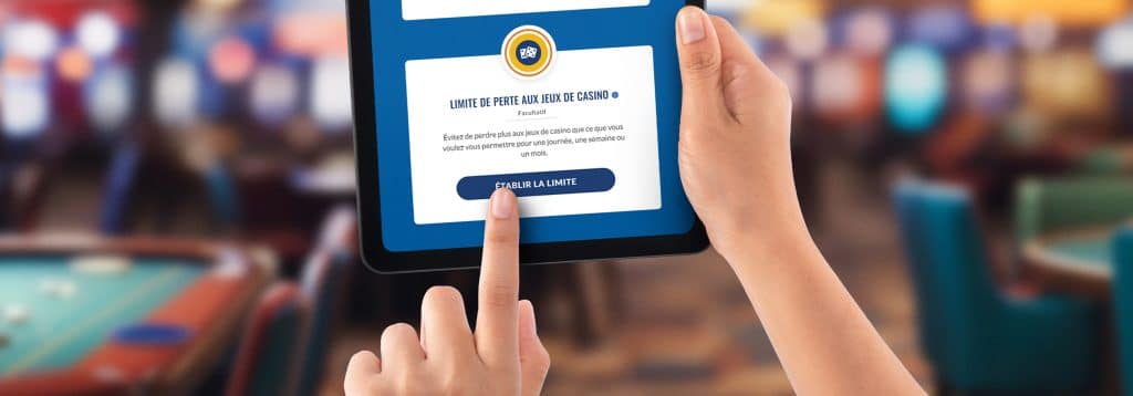 Un outil pour limiter les pertes au casino est affiché sur l’écran d’une tablette.